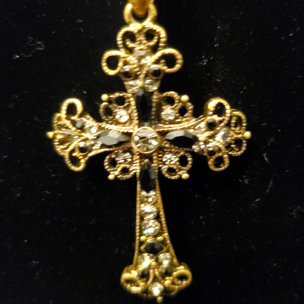 Ornate gold tone filigree cross necklace